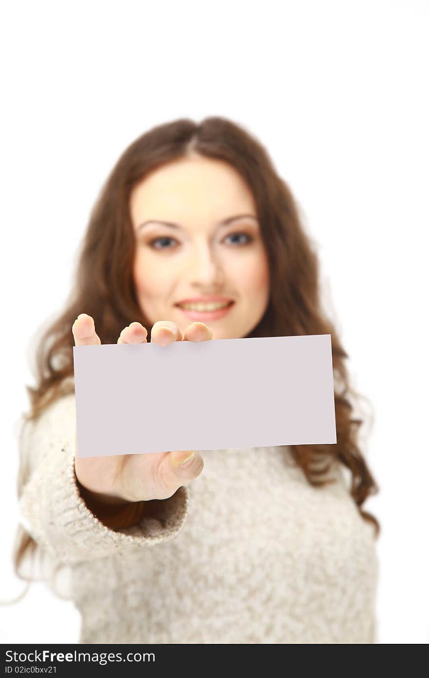 Young woman holding an empty billboard over white background