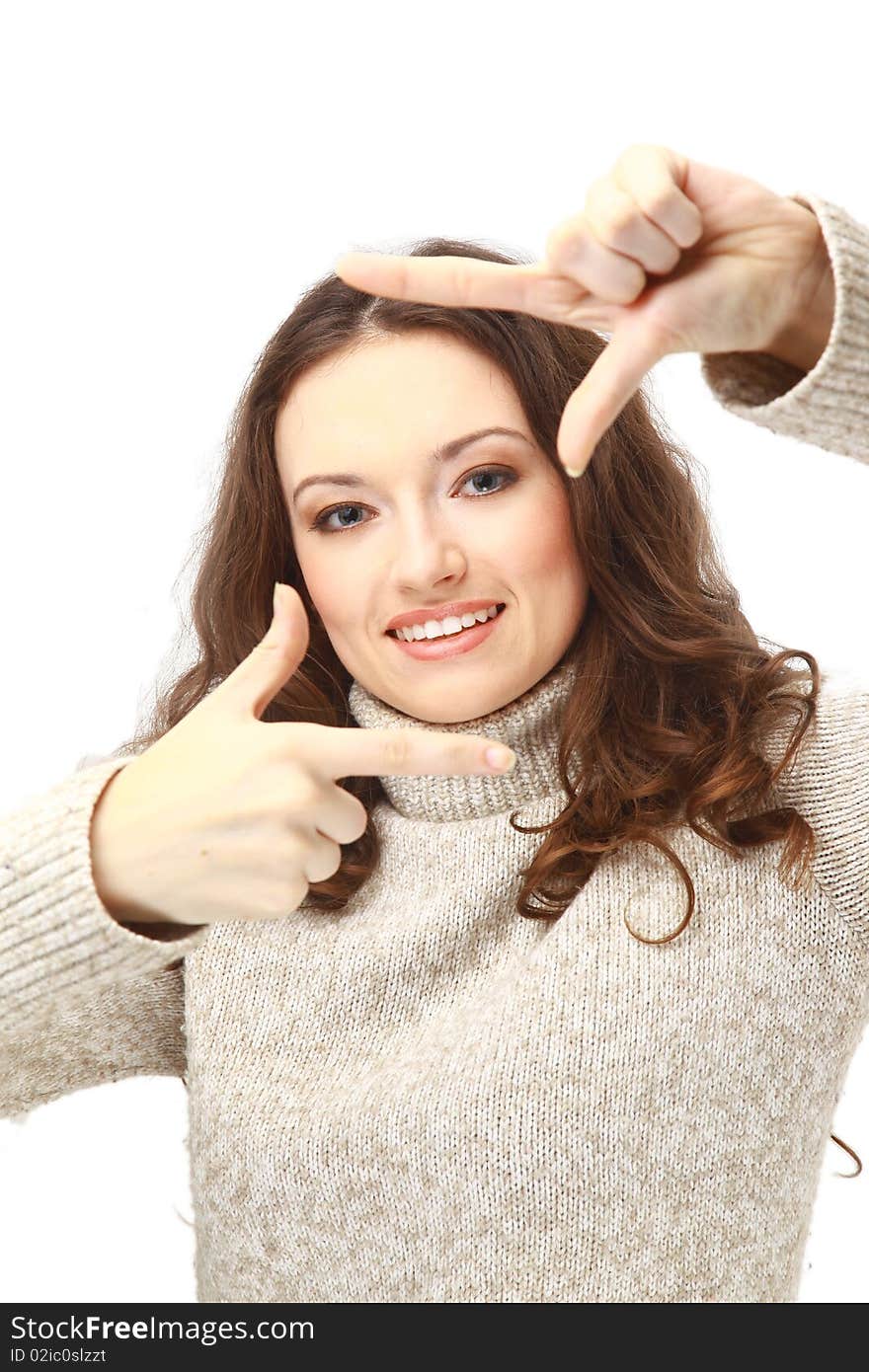 Young woman creating a frame with her fingers