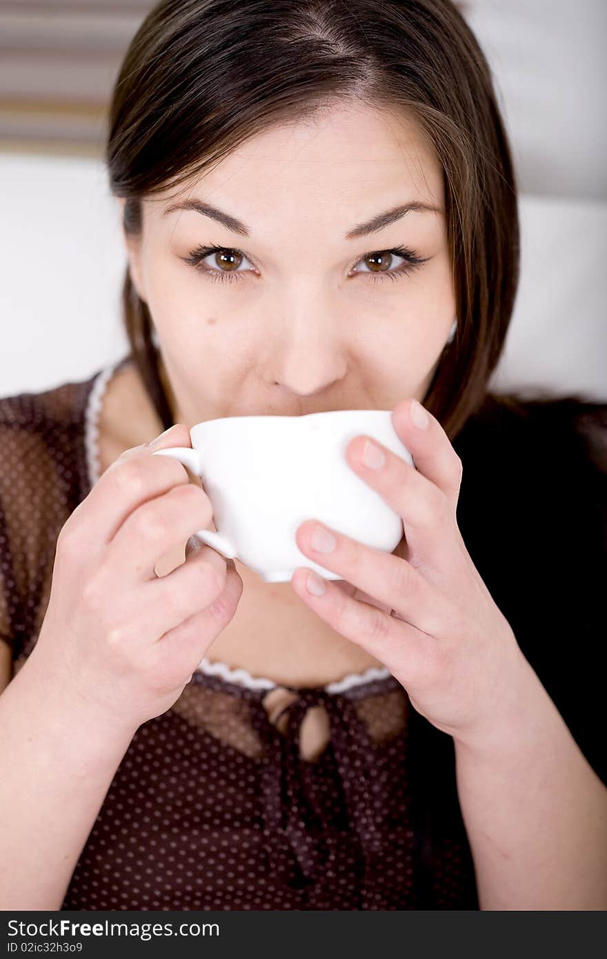 Young attractive nrunette woman in bed. Young attractive nrunette woman in bed