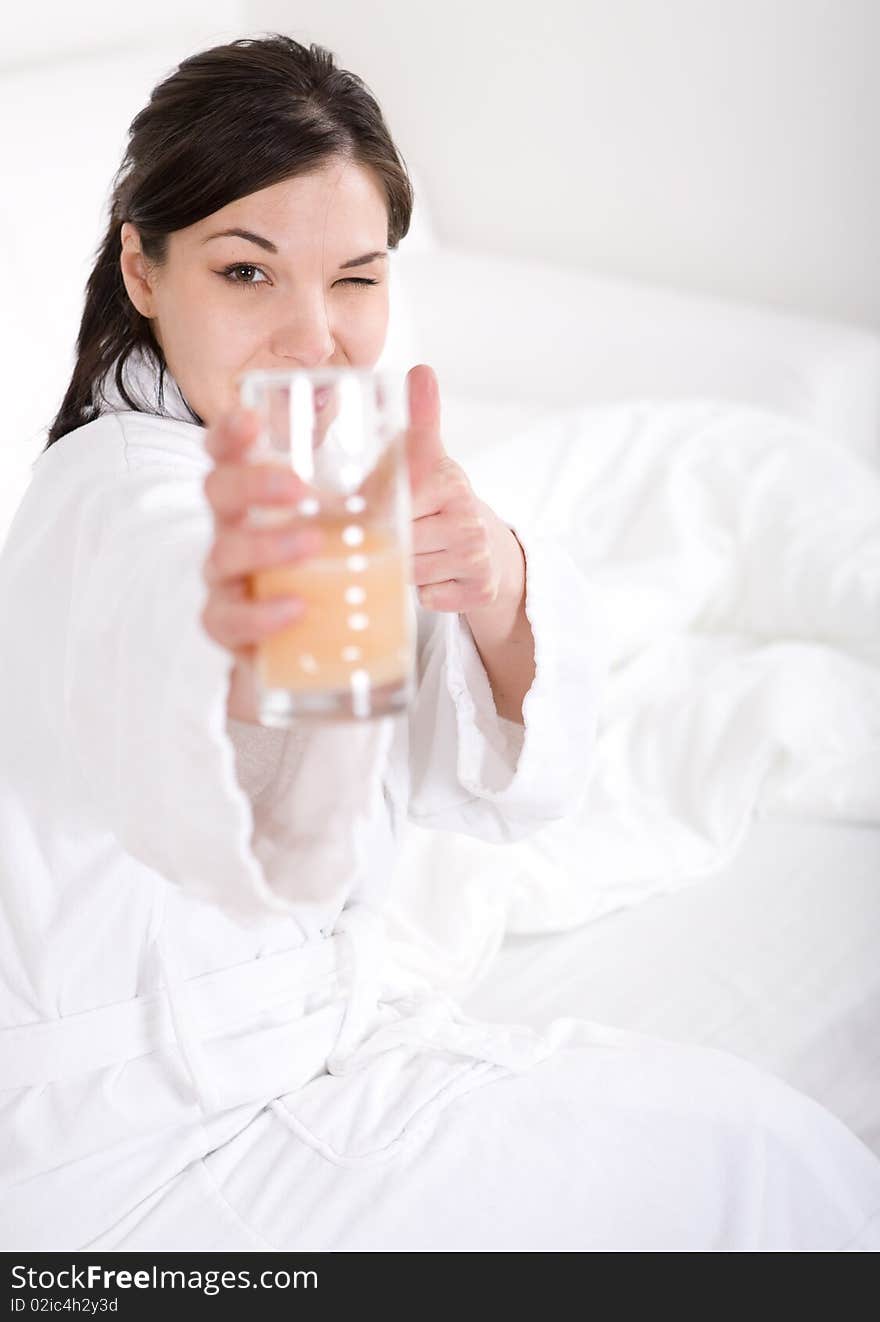 Young attractive nrunette woman in bed. Young attractive nrunette woman in bed