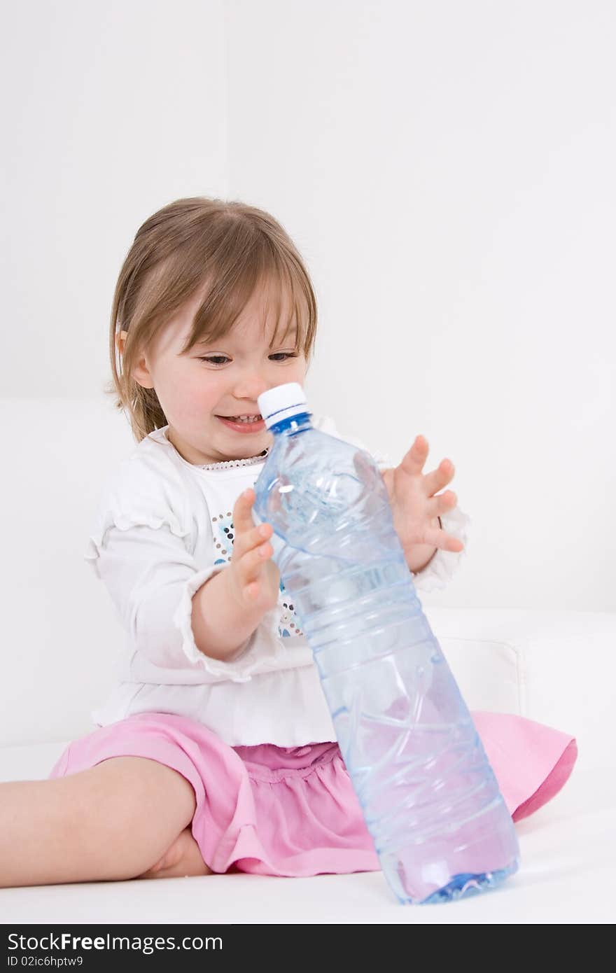 Happy little girl with water. Happy little girl with water