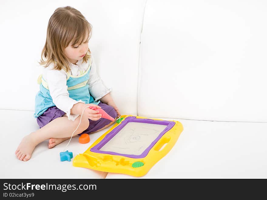 Sweet toddler little girl drawing