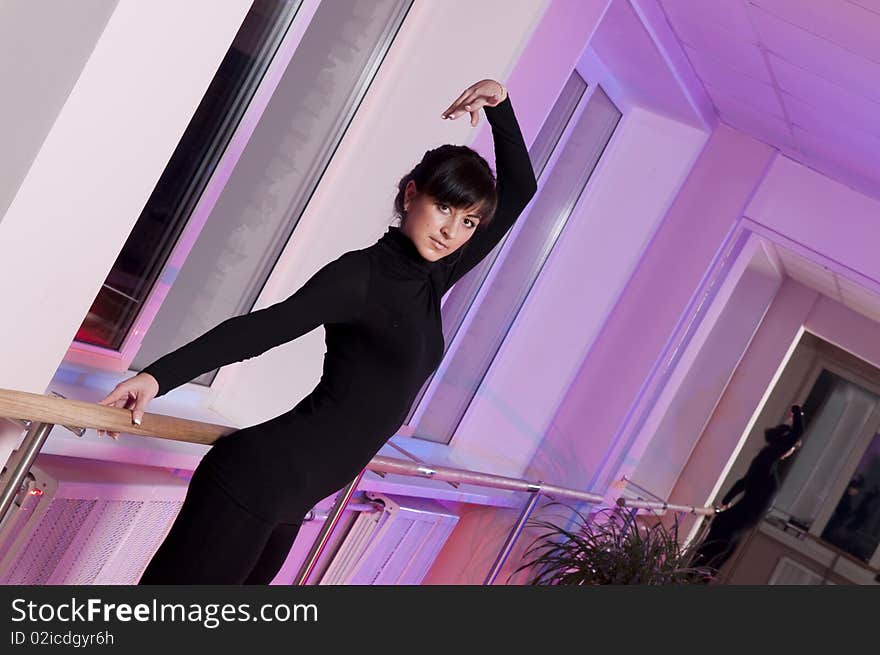 Dancing girl in ballet dance studio