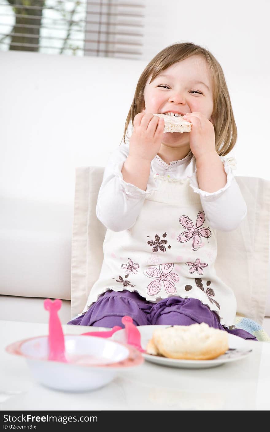 Sweet toddler little girl eating