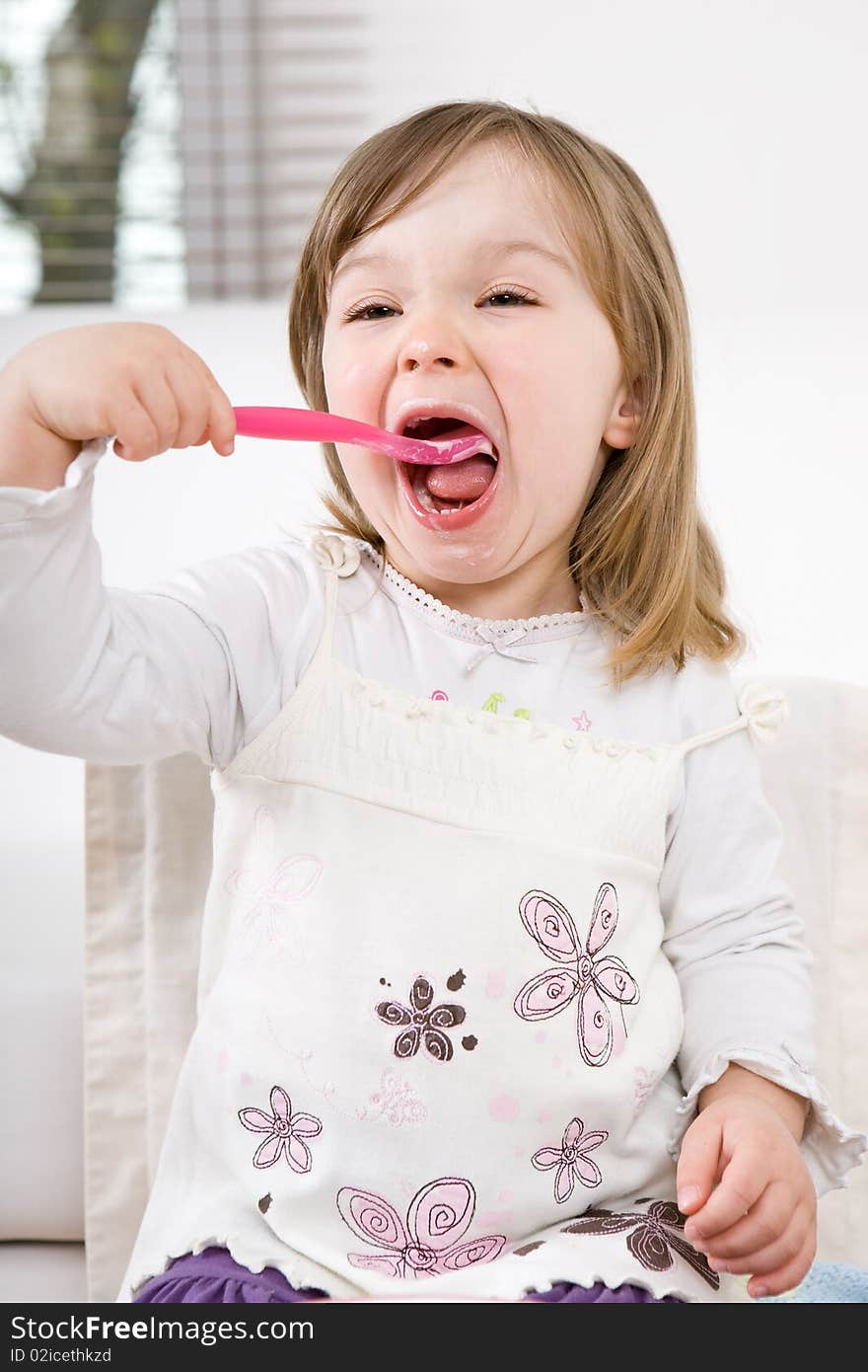 Sweet toddler little girl eating