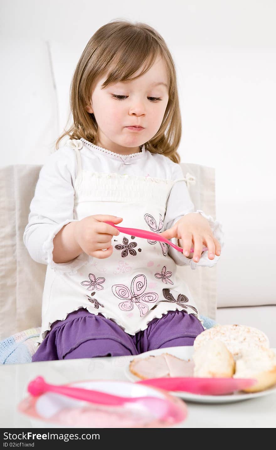 Sweet toddler little girl eating