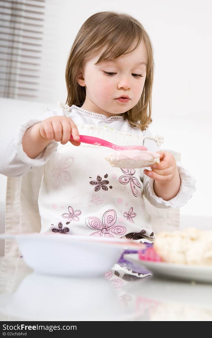 Sweet toddler little girl eating