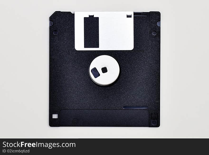 One floppy disk isolated on white background