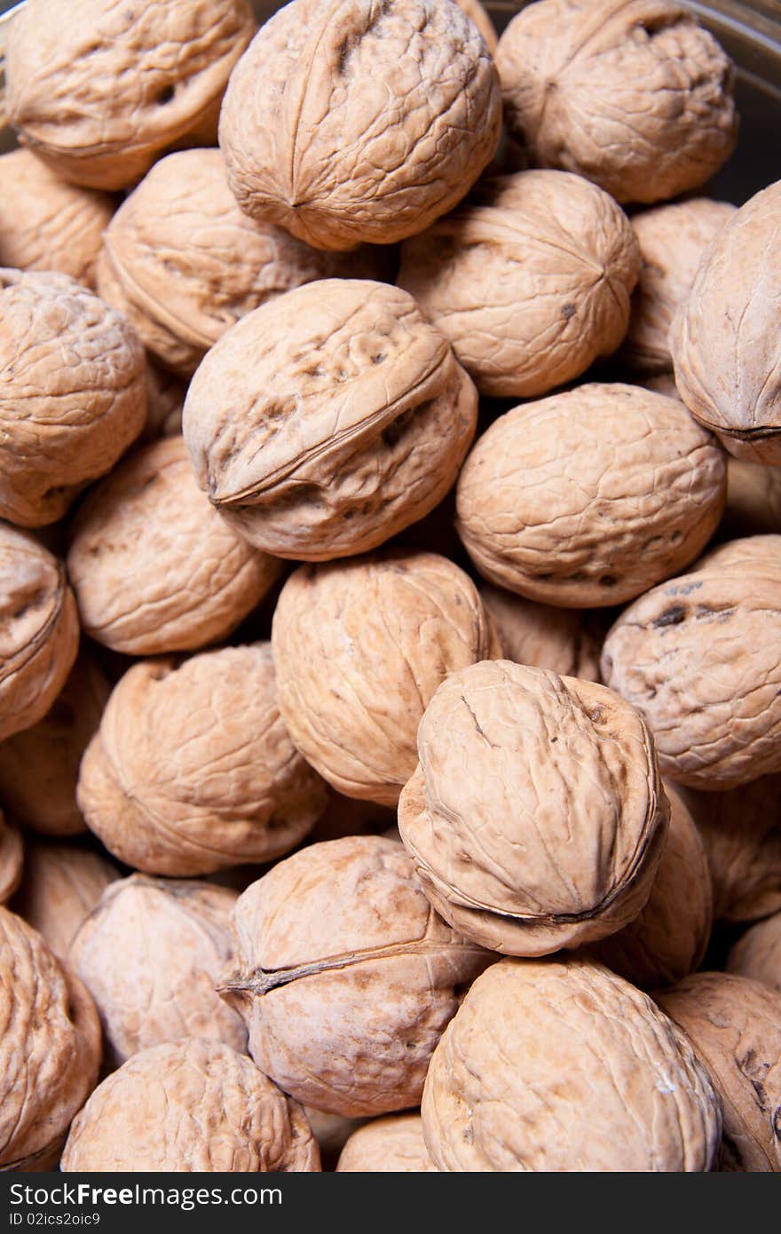 Dry brown different walnuts closeup