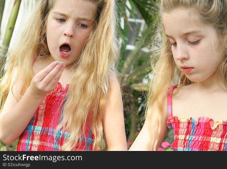 Shot of a child eating sprinkles