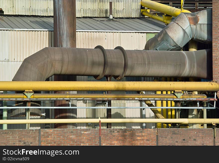 Part of the Heat and Gas Pipes of a modern Furnace to Produce Steel Old Furnace seen from below. Part of the Heat and Gas Pipes of a modern Furnace to Produce Steel Old Furnace seen from below