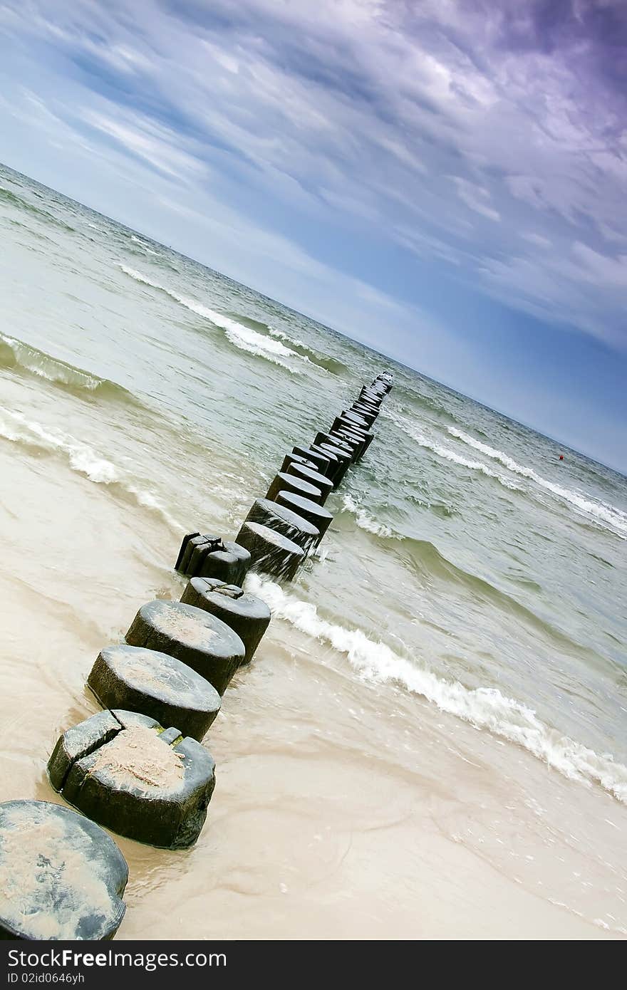 Breakwater and wavy water. Baltic sea. Breakwater and wavy water. Baltic sea.