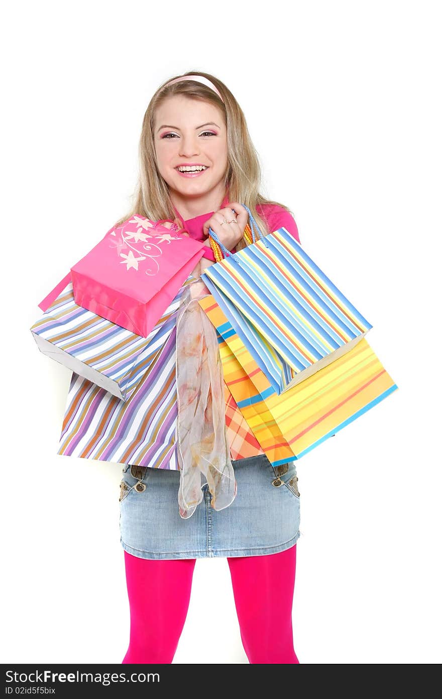 Young happy girl with shopping bags