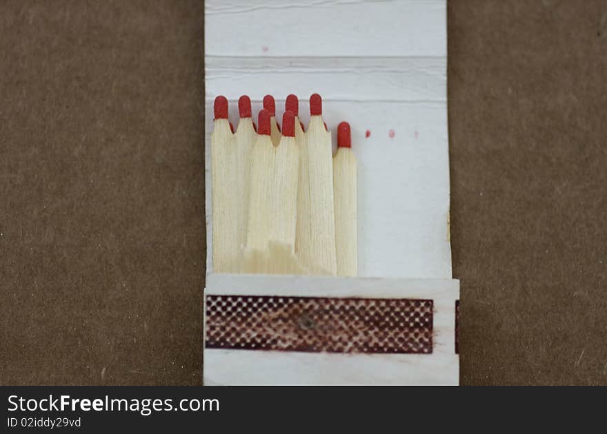 Matchbox on a brown background