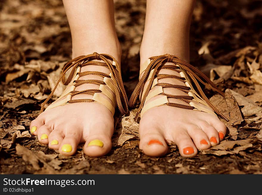 Barefooted tender woman s feet. Shoes concept