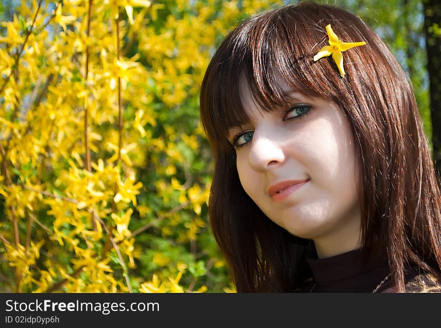 Beautiful girl with spring flowers