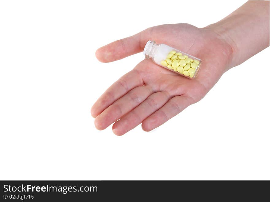 Holding yellow tablets in hand. Holding yellow tablets in hand