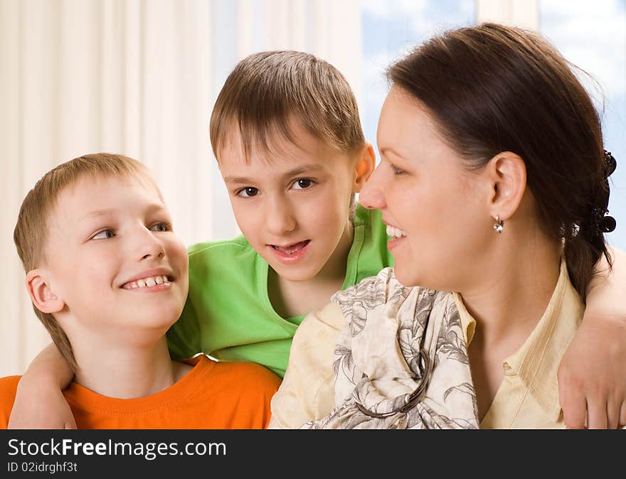 Happy mother with her two children. Happy mother with her two children