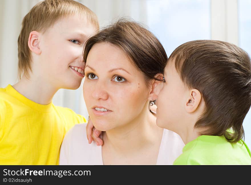 Mother next to children