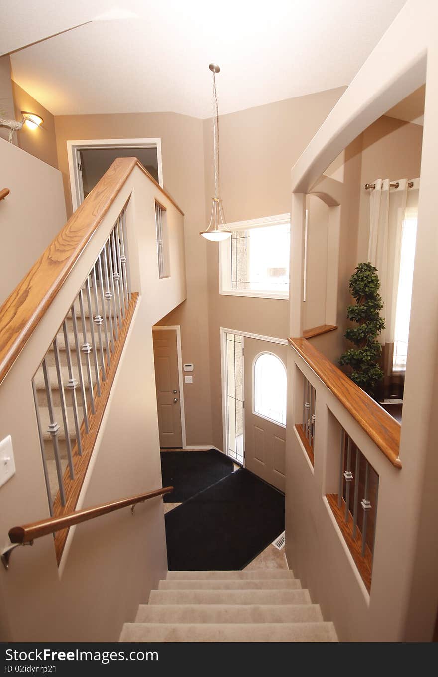 A photo of an interior of a home. A photo of an interior of a home