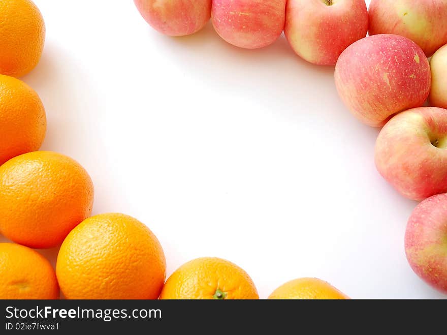 Oranges and apples forming a fruit frame