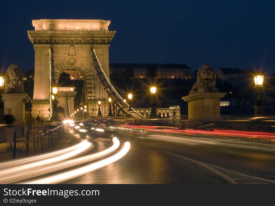 Budapest is a beautiful bridge, the cars are going.