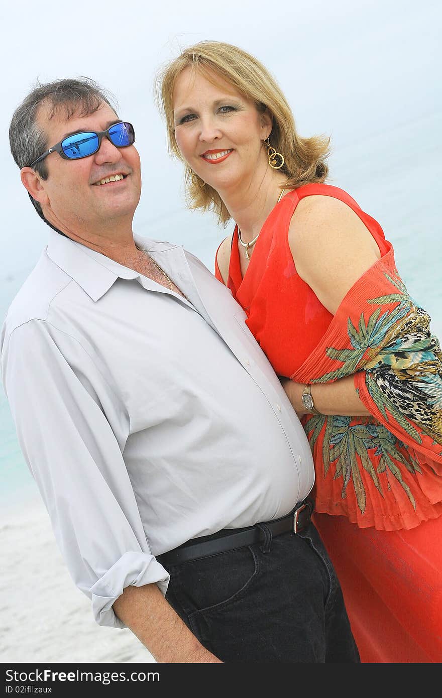 Gorgeous Couple On The Beach Vertical