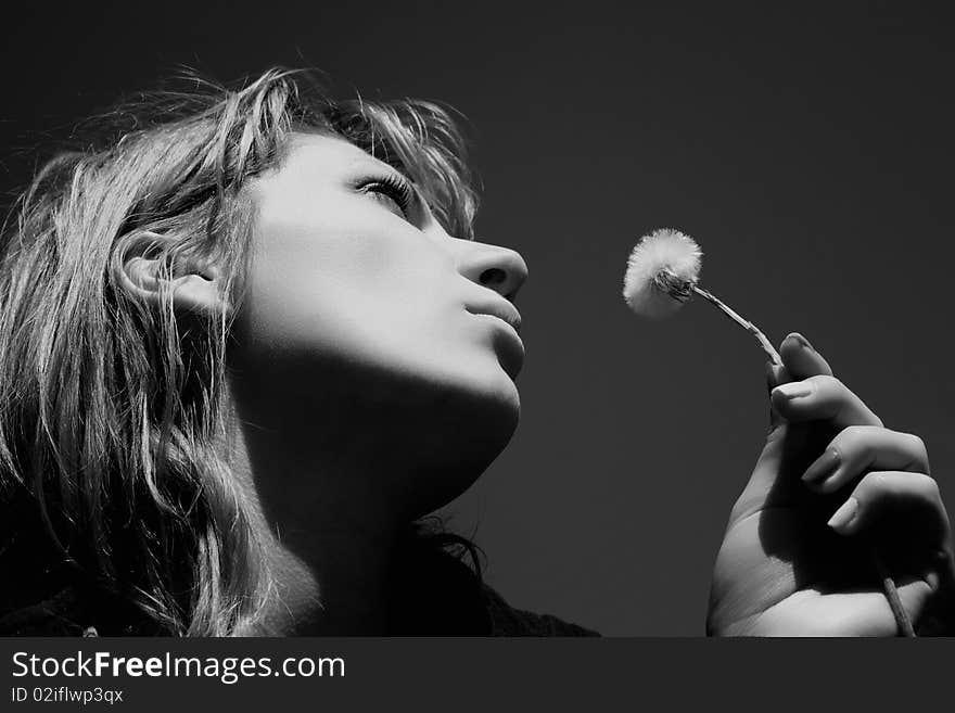 Woman with dandelion