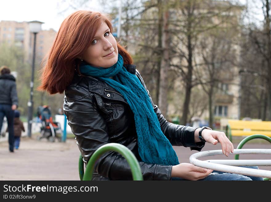 Sportive Girl Riding Carousel