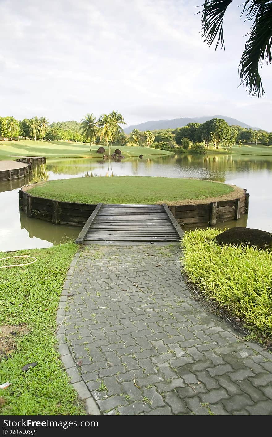 Tiny man made island in a gold course