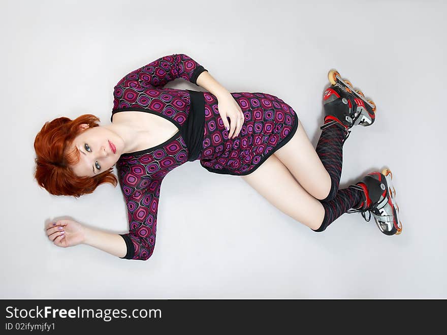 Woman In Dress On Roller-skates