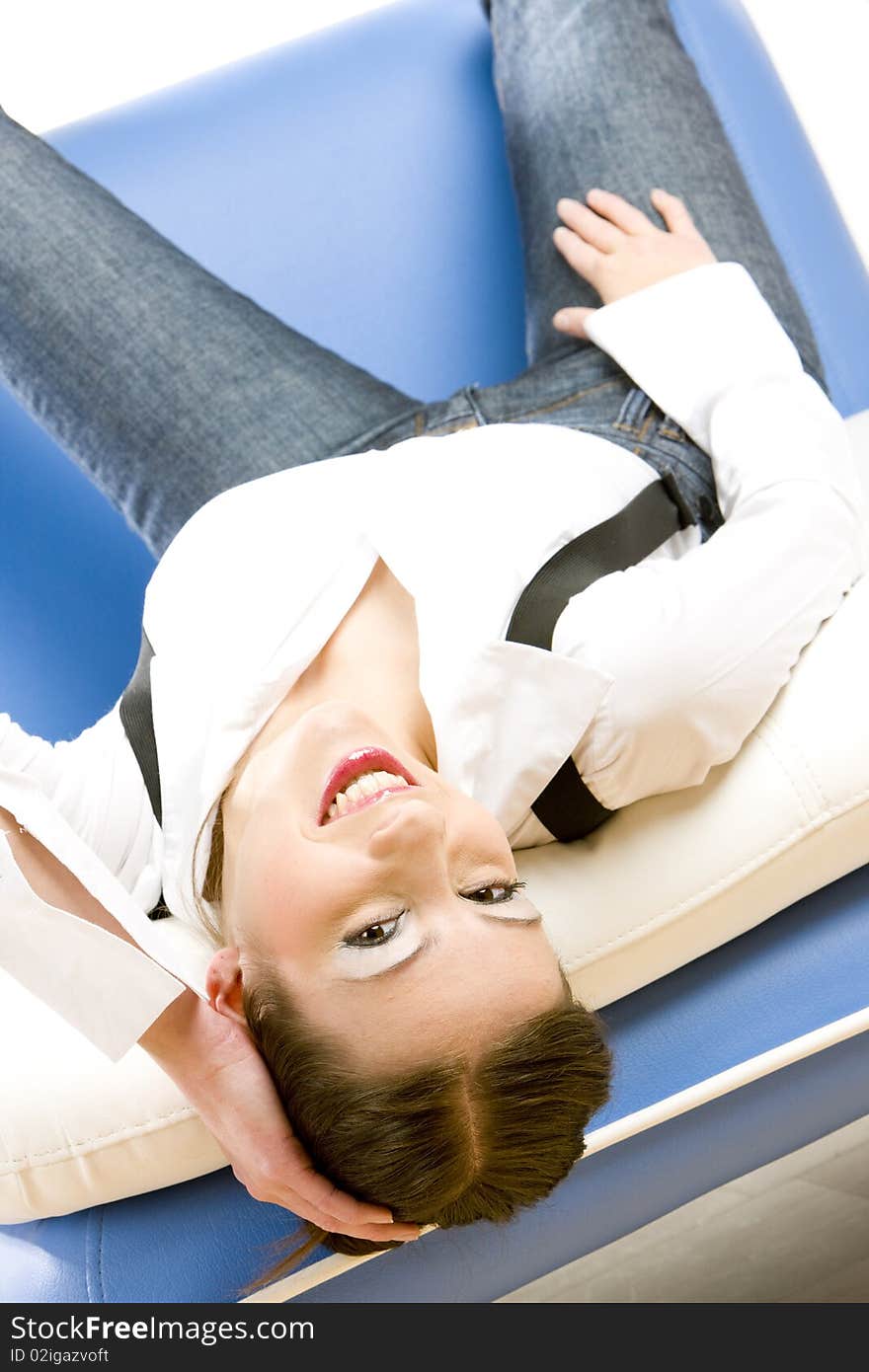 Young woman lying on sofa. Young woman lying on sofa