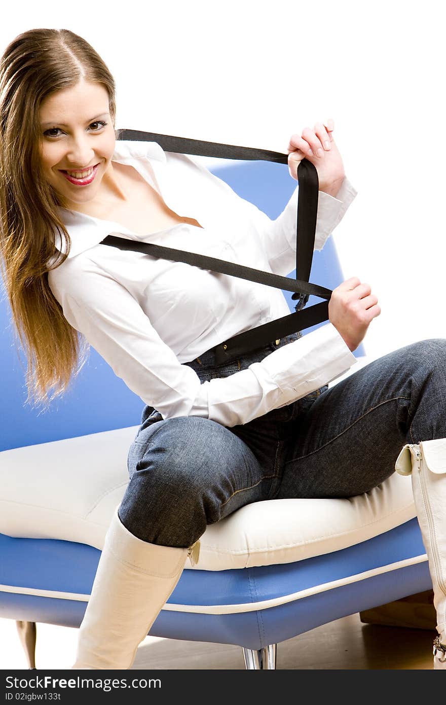 Young woman sitting on sofa. Young woman sitting on sofa