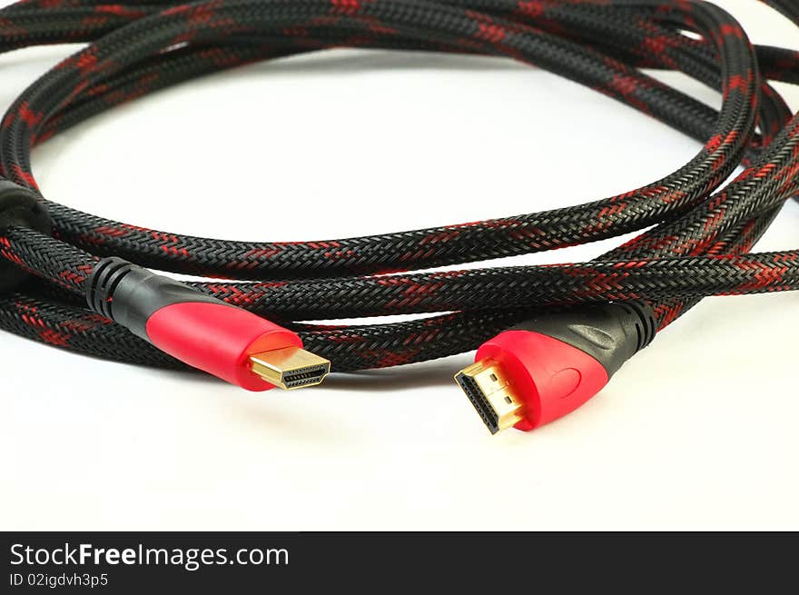 A HDMI Cable isolated on white background, detail on the connectors. A HDMI Cable isolated on white background, detail on the connectors