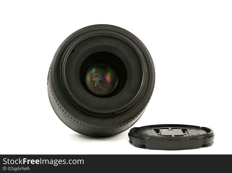 A 35mm prime dslr lens in detail isolated on white background frontal view. A 35mm prime dslr lens in detail isolated on white background frontal view