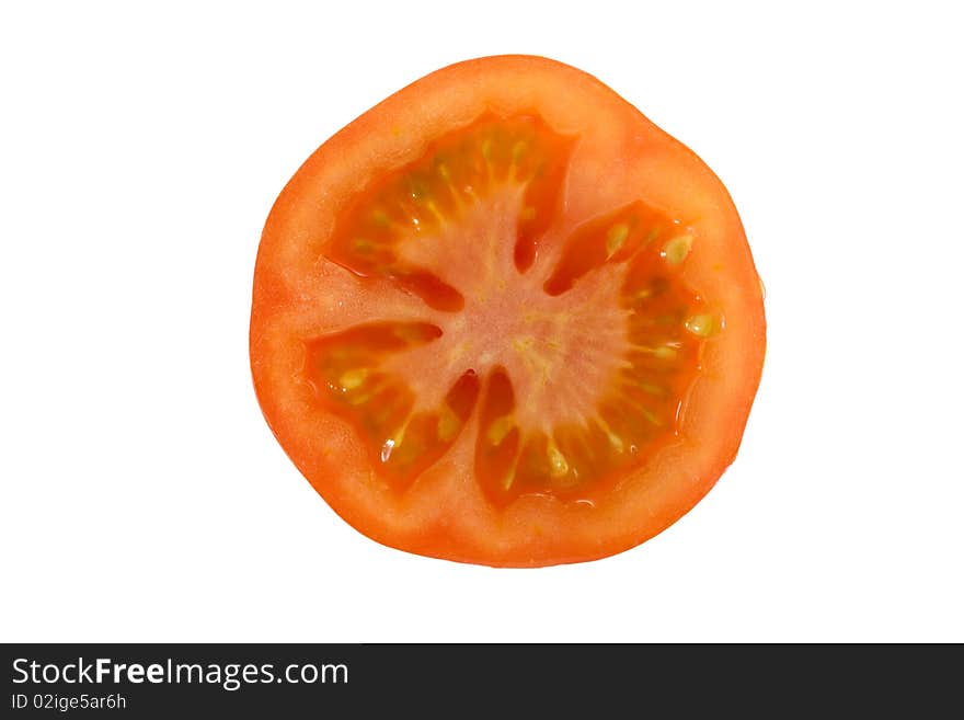 Macro of a sliced juicy red tomatoe isolated on white. Macro of a sliced juicy red tomatoe isolated on white