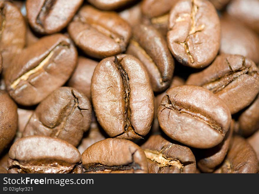 Many zoomed coffee beans in the picture