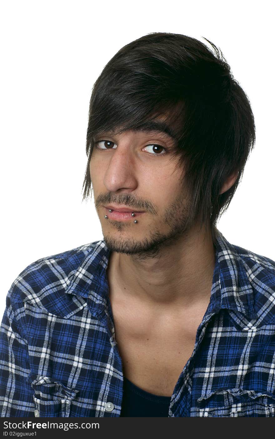 Portrait of a  young good looking  man with piercing on white. Portrait of a  young good looking  man with piercing on white