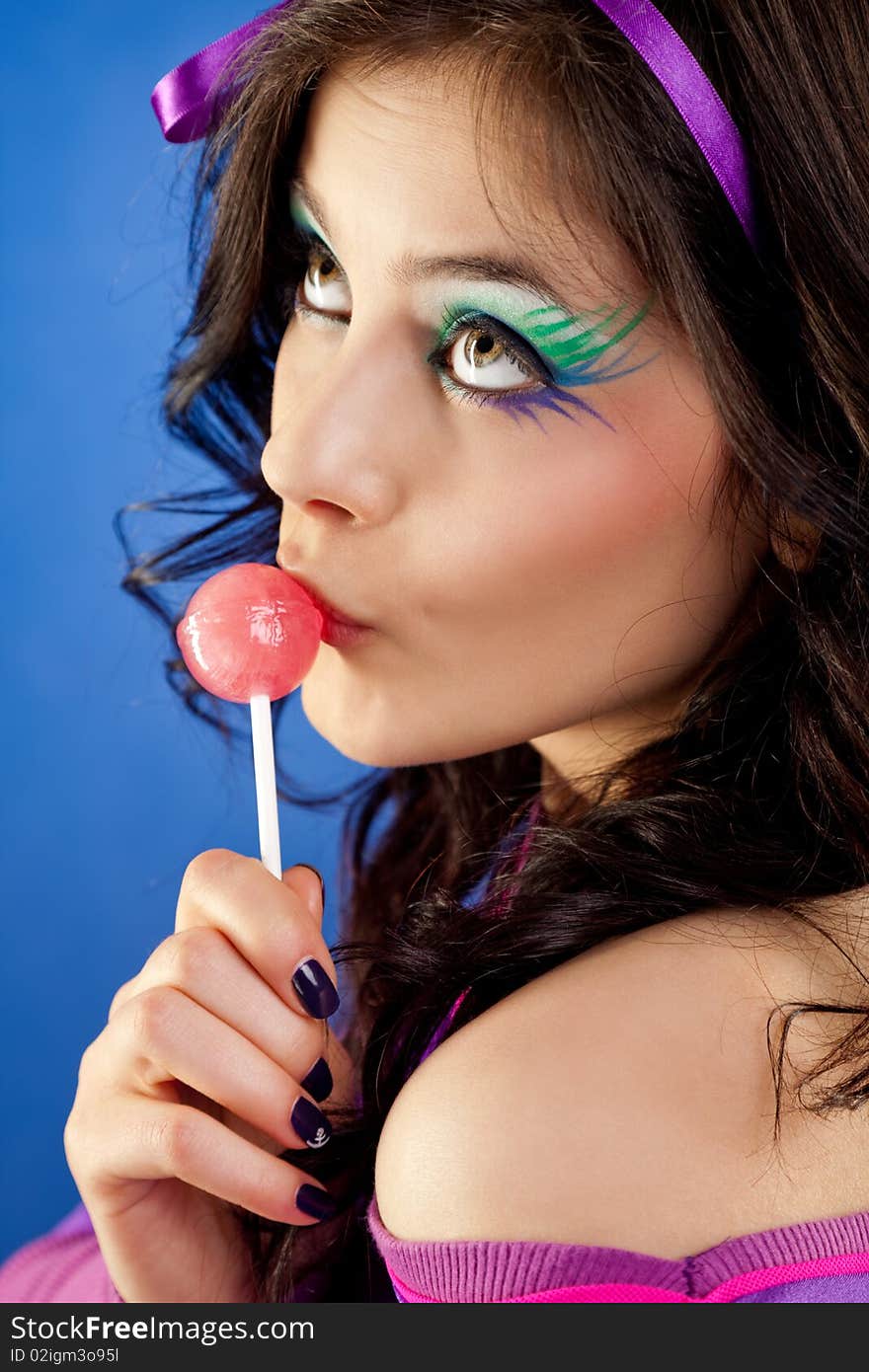 Girl Licking Lollipop