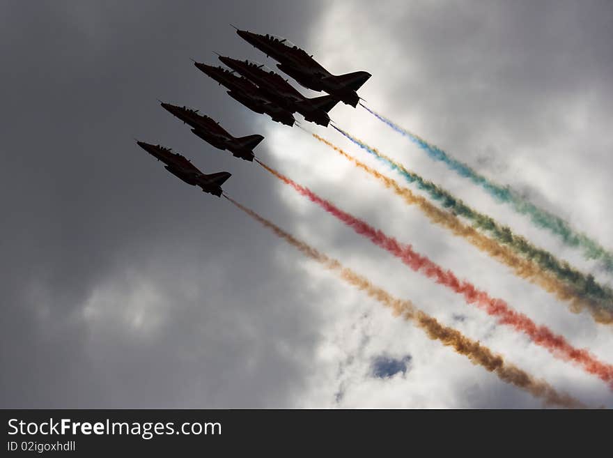 A silhouette of Five airplanes flying in formation. A silhouette of Five airplanes flying in formation