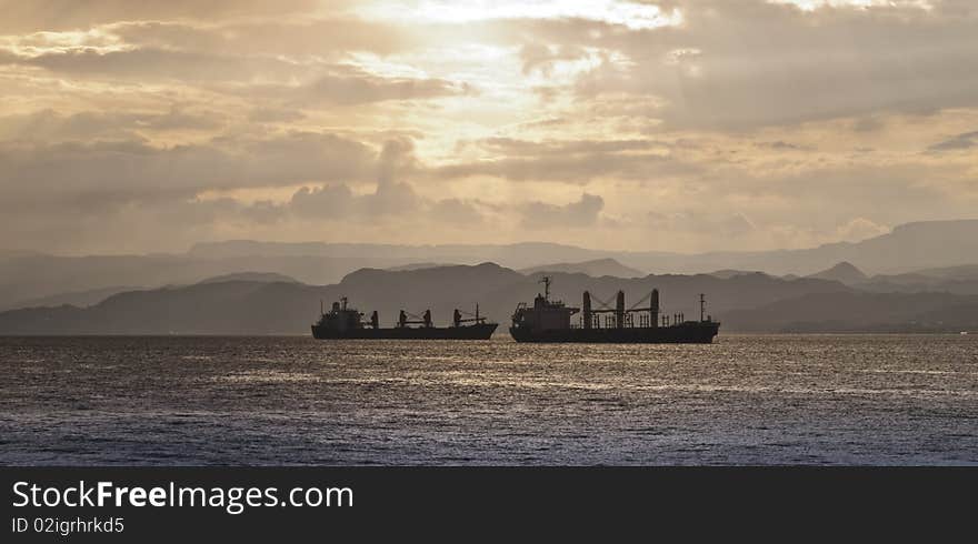 Haulage cargo boats and sunset