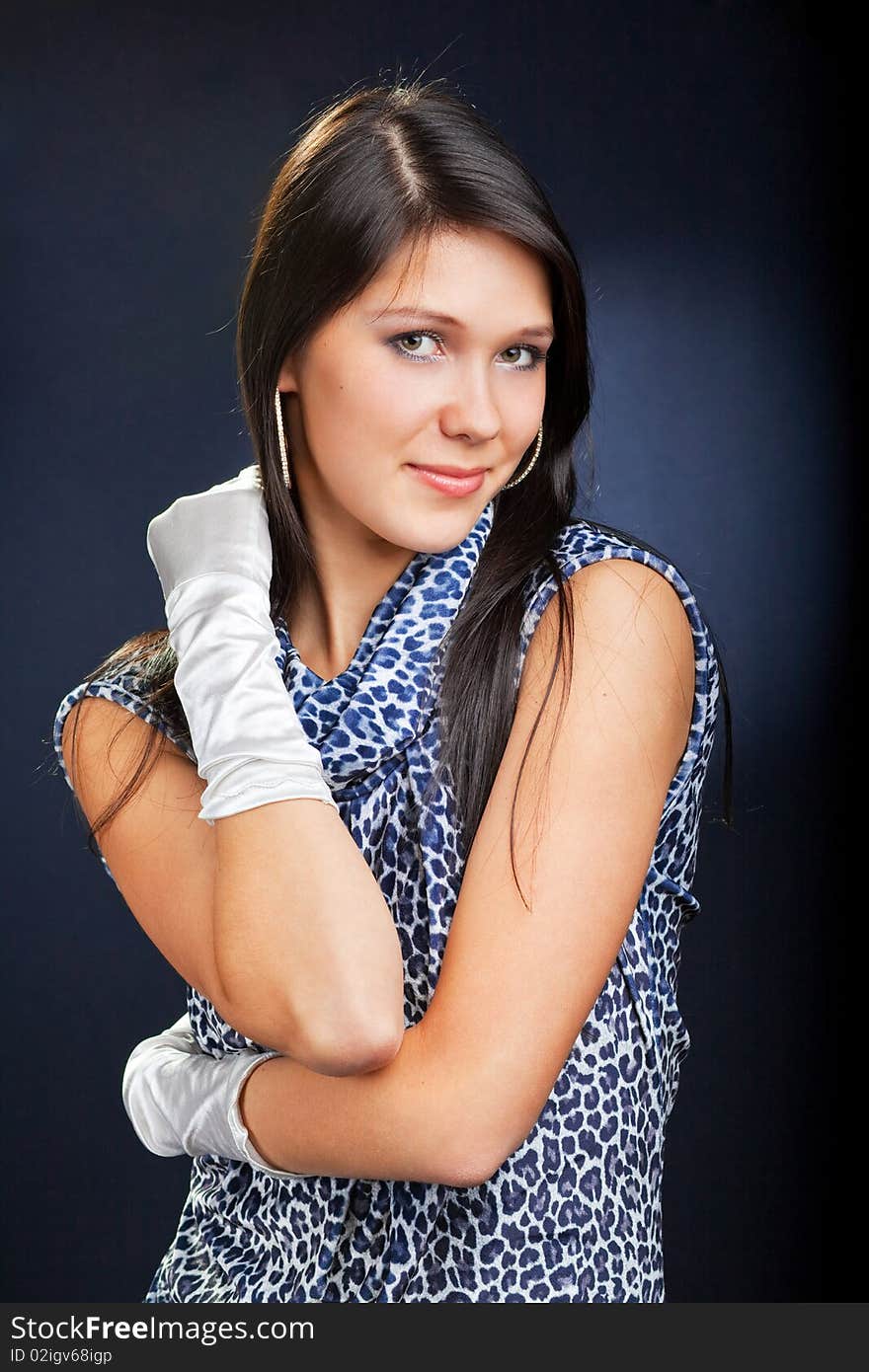 Beautiful woman in dress and gloves