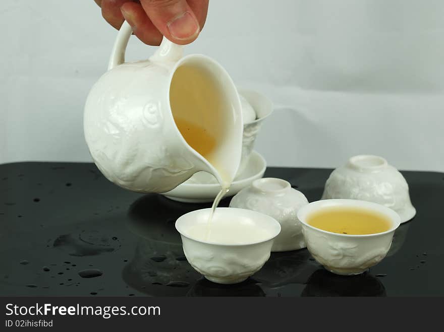 They are chinese teapot and teacup for Kungfu tea.Kongfu tea is kind of particular stlye of drinking tea,it's also a kind of tea-culture. They are chinese teapot and teacup for Kungfu tea.Kongfu tea is kind of particular stlye of drinking tea,it's also a kind of tea-culture.