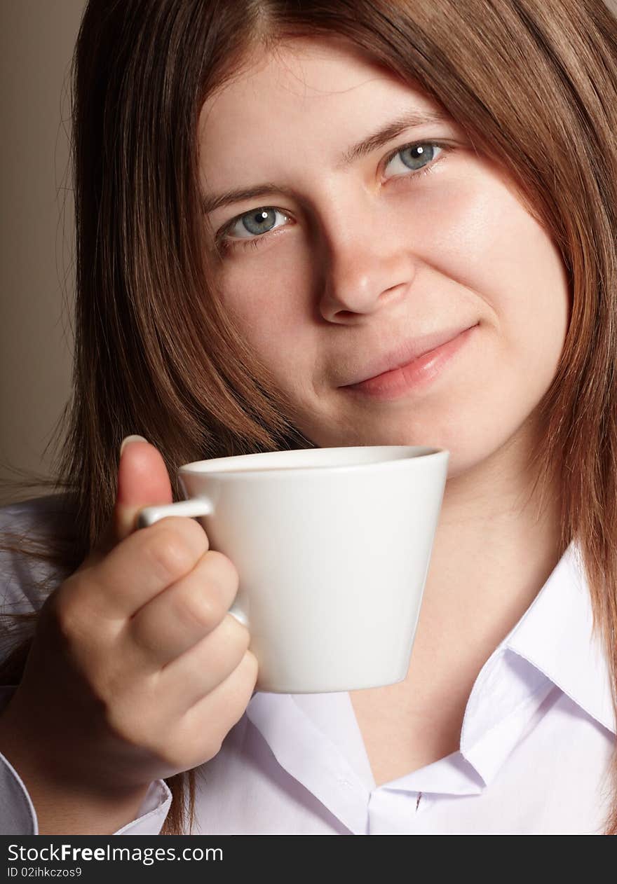 Shot of young girl with coffee