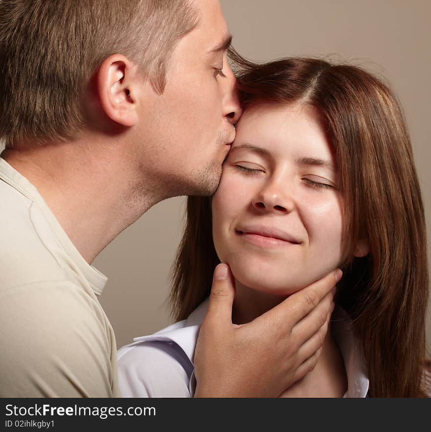 Couple. young guy kissing girl