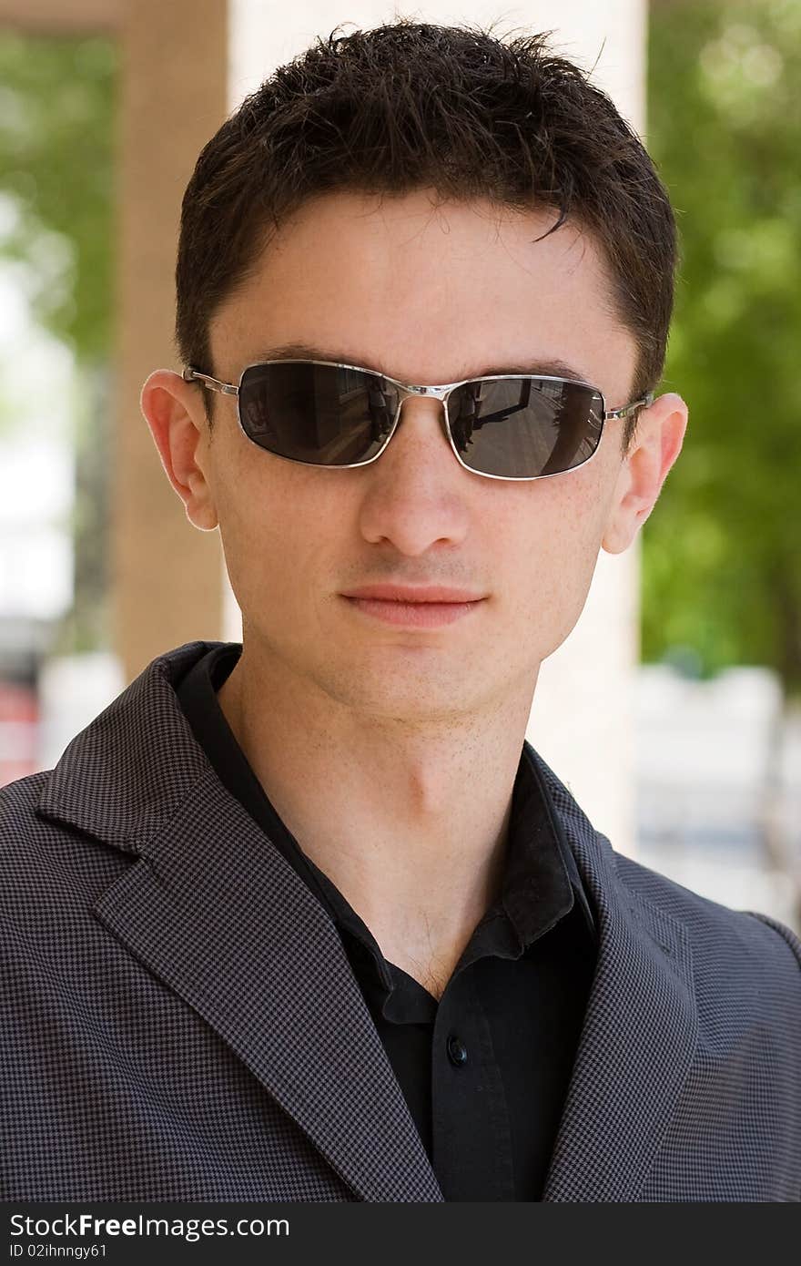 Portrait of white man in sunglasses