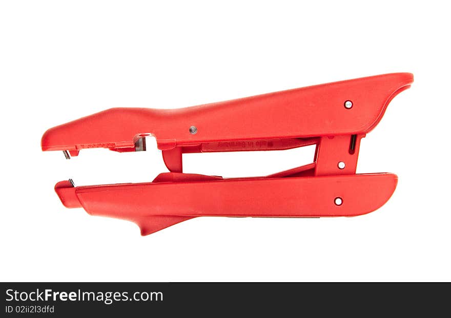 Red wire cutting and stripping tool isolated om white. Red wire cutting and stripping tool isolated om white