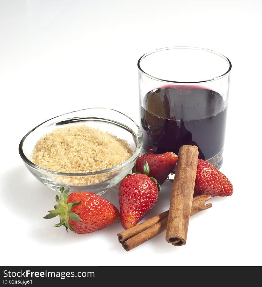 Ingredients to make strawberry wine on a white background