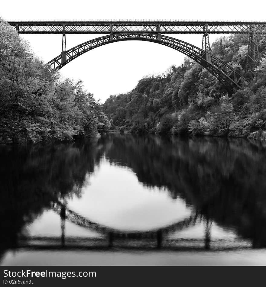 Iron bridge on Adda river. Lombardy, Italy.