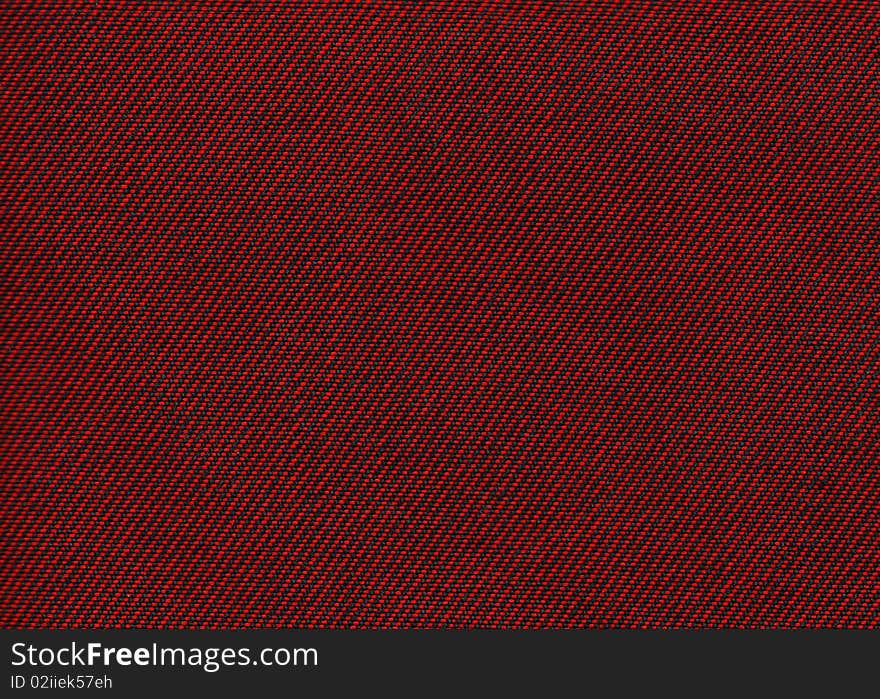 Red jeans texture close up